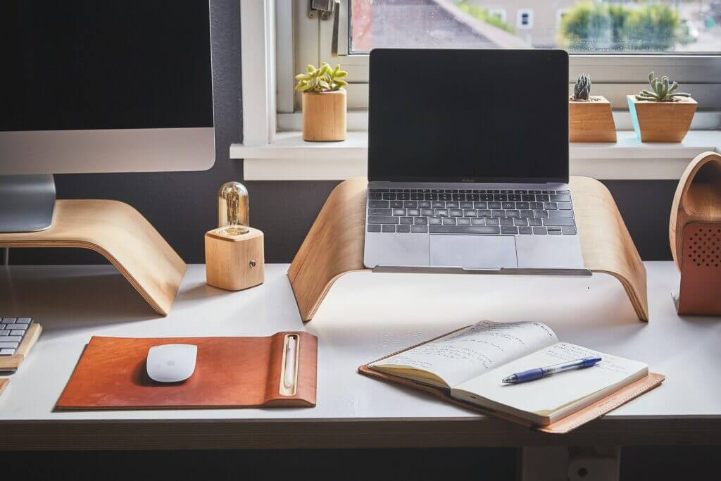 Desk with laptop & monitor - 3 Months of Owning my own Marketing Agency