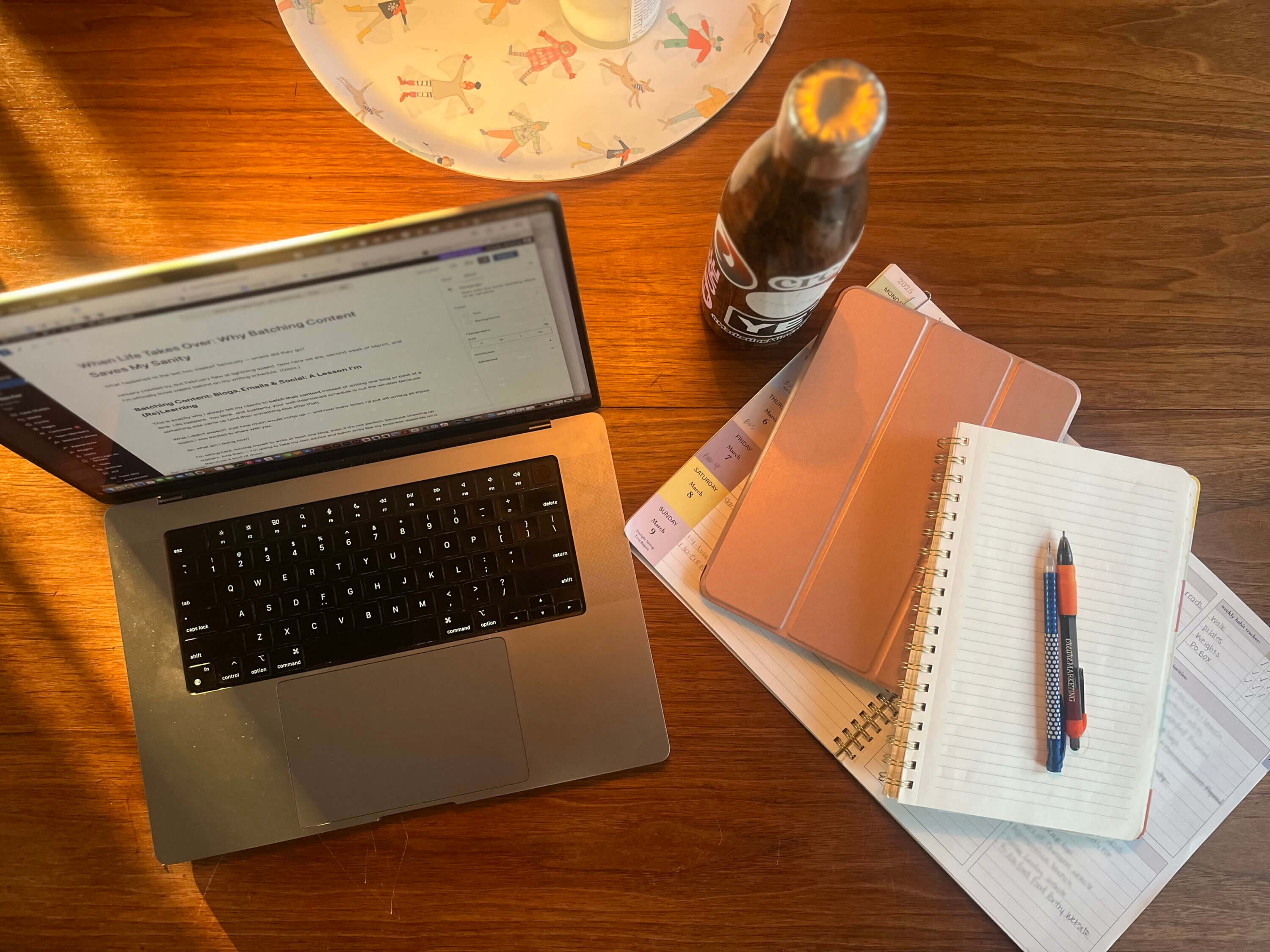 My table as I write my latest blog: When Life Takes Over: Why Batching Content Saves My Sanity